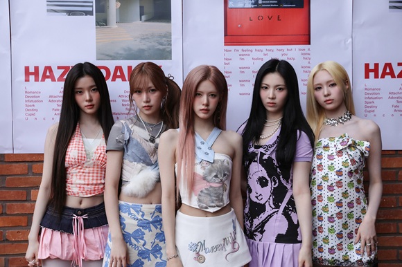 'As if'에는 타이틀곡 'Hazy (Daisy)'를 포함해 다양한 장르의 5곡이 수록됐다. 'Hazy (Daisy)'은 드럼앤베이스 장르를 기반으로한다./하이헷엔터테인먼트