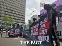  ‘CU 화물노동자 사망’ 서울 도심서 1000명 추모 행렬