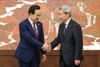  신현송 총재, 박홍근 장관과 첫 회동…