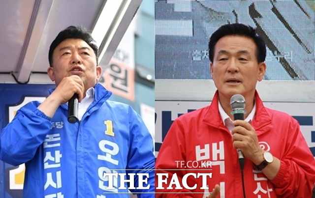 오인환(왼쪽) 더불어민주당 논산시장 후보와 백성현 국민의힘 논산시장 후보가 21일 오후 첫 유세를 하고 있다. /오인환·백성현 후보 캠프
