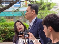  '계엄 가담 의혹' 김명수 전 합참의장 특검 출석…'무거운 책임감'