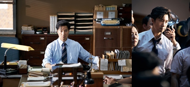 영화 '암살자(들)'이 언론인으로 변신한 박해일의 얼굴이 담긴 캐릭터 스틸을 공개했다. /㈜하이브미디어코프