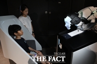  초상화 그리는 로봇 [포토]