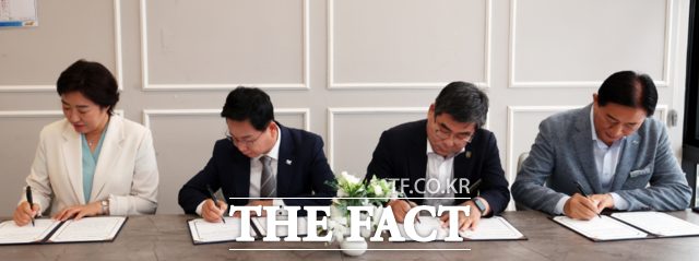 전남광주시 광산구·북구·담양군·장성군 4개 지자체장이 상생발전 협약 서명을 하고 있다. /광산구