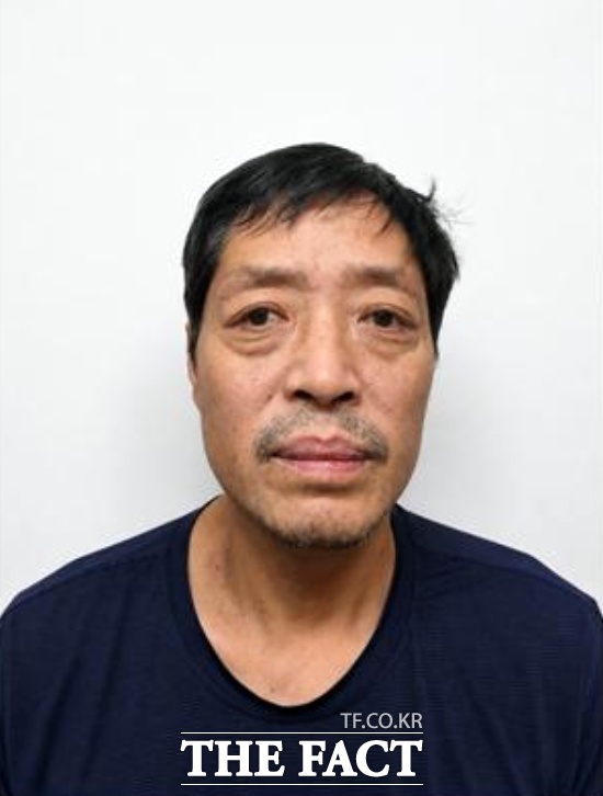 스토킹 혐의로 고소한 옛 여자친구를 흉기로 찔러 숨지게 해 보복살인 혐의로 구속 송치된 김상수(52). /경기남부경찰청