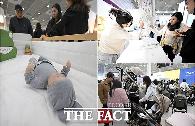 '코엑스 코베 베이비페어'가 29일 오전 서울 강남구 코엑스 A홀에서 개막한 가운데 관람객들이 유아용 카시트를 둘러보고 있다. /박상민 기자